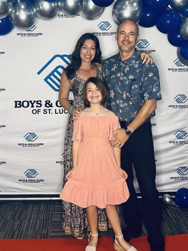 Family Connector, Eden Wood with her partner and child.